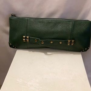 Dark green faux leather clutch.